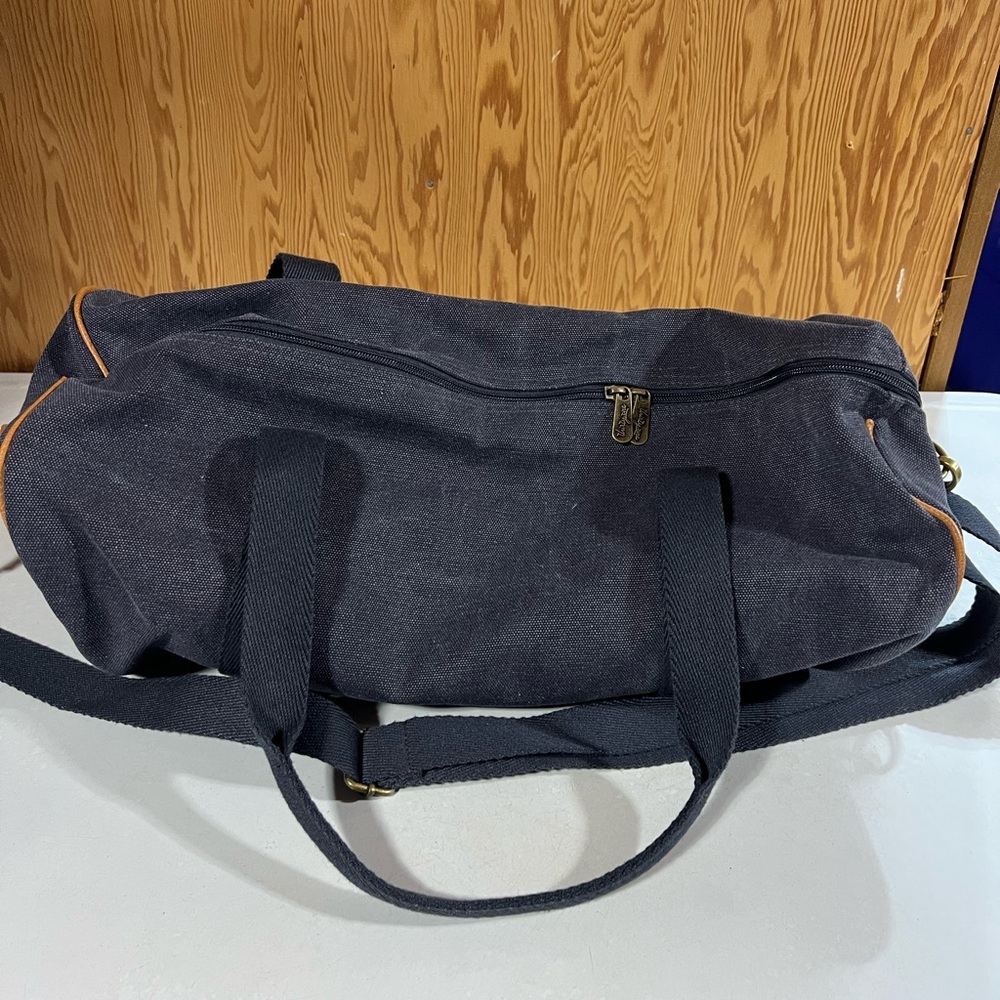 Stylish Dark Grey Duffel Bag with Tan Accents